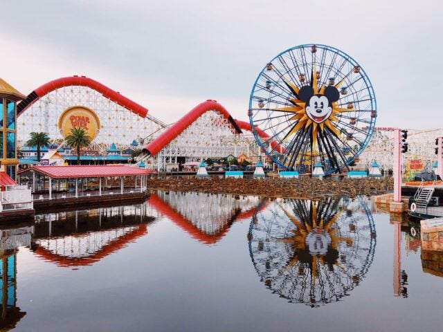 An image of a Mickey Mouse ferriss wheel across a lake at Disneyland