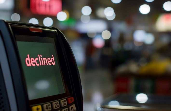 A payment terminal screen displaying the word 