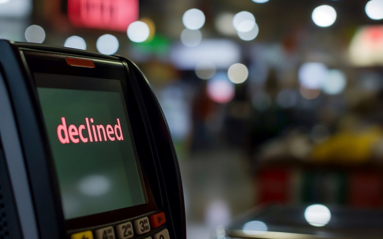 A payment terminal screen displaying the word 