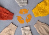 Clothing recycling. Used clothes in a circle. Ecological and sustainable fashion